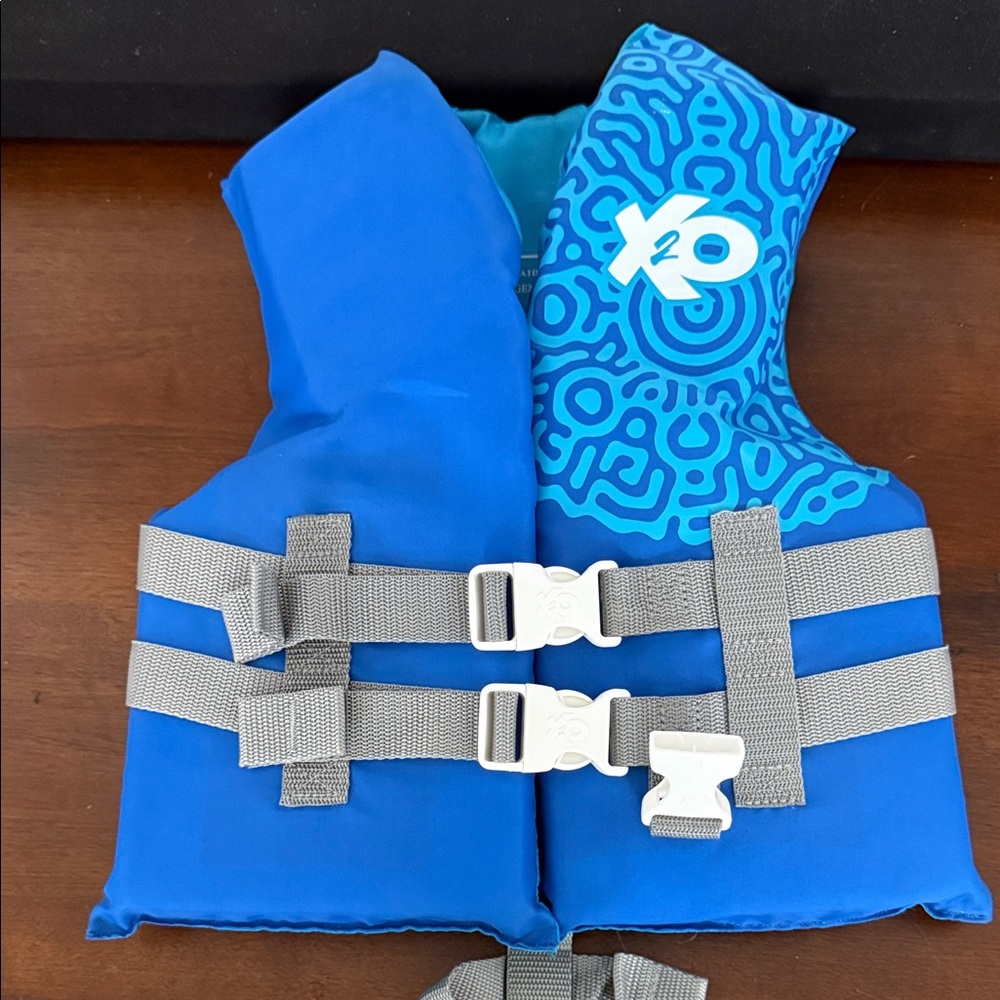 Blue Life Vest with Patterned Design